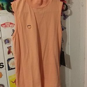 Unif peach tank